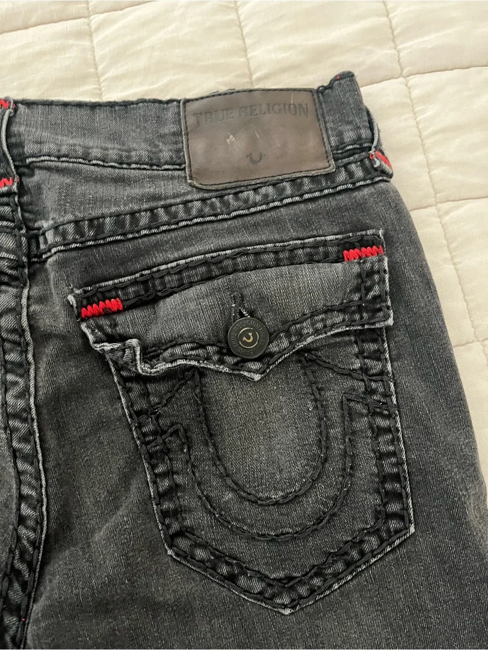 True Religion Men’s Black Denim Cutoff Shorts with flaw